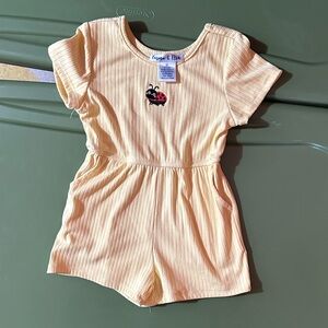 Adorable Yellow Romper with Ladybug Design